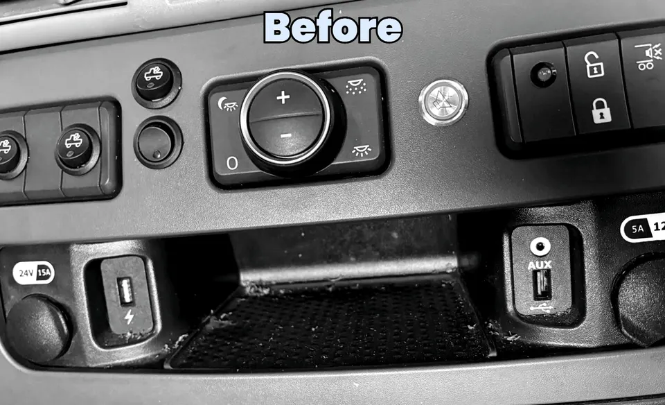 HGV switch panel and storage tray covered in dust before cleaning