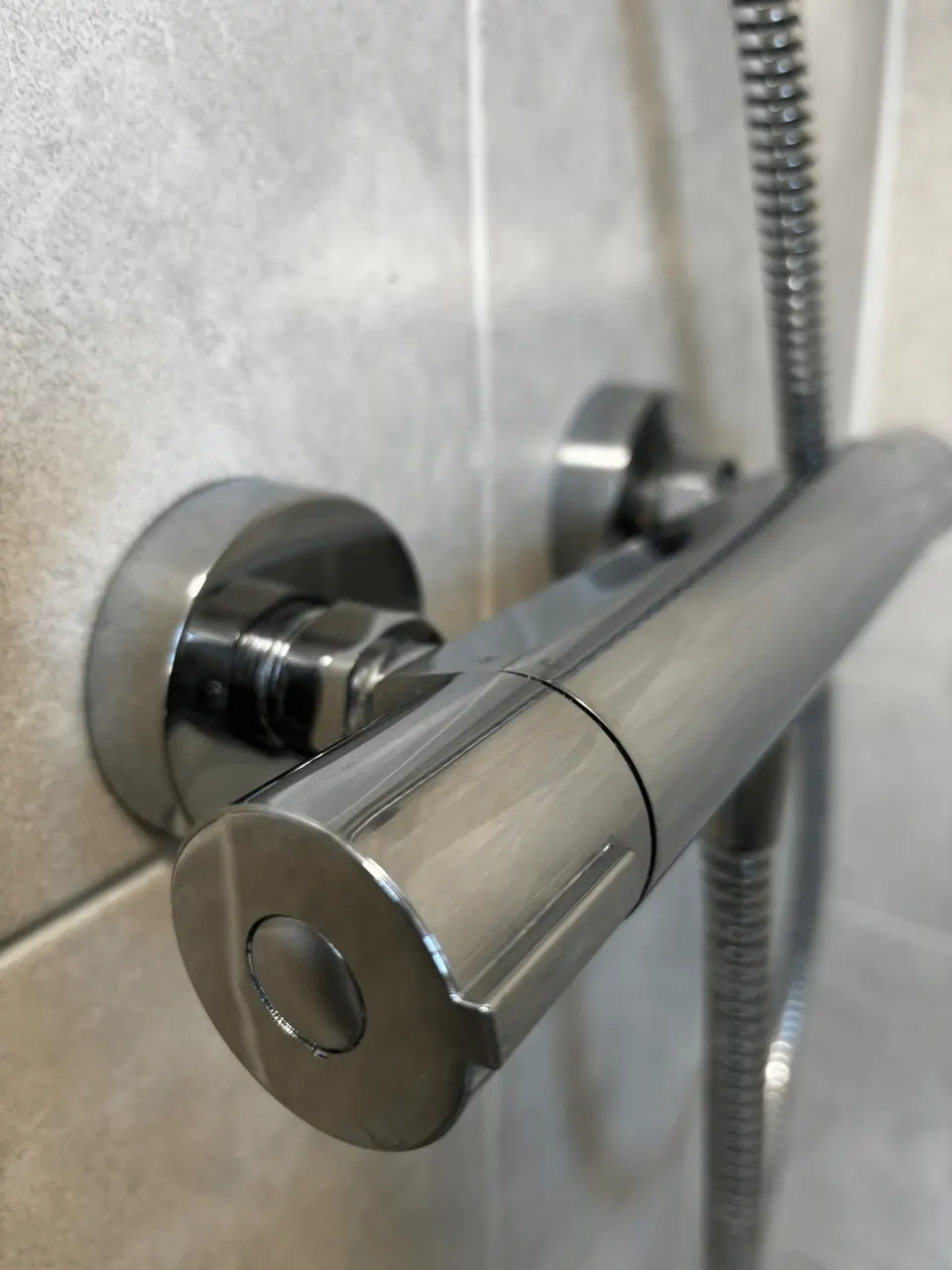 The same shower valve polished and free of limescale