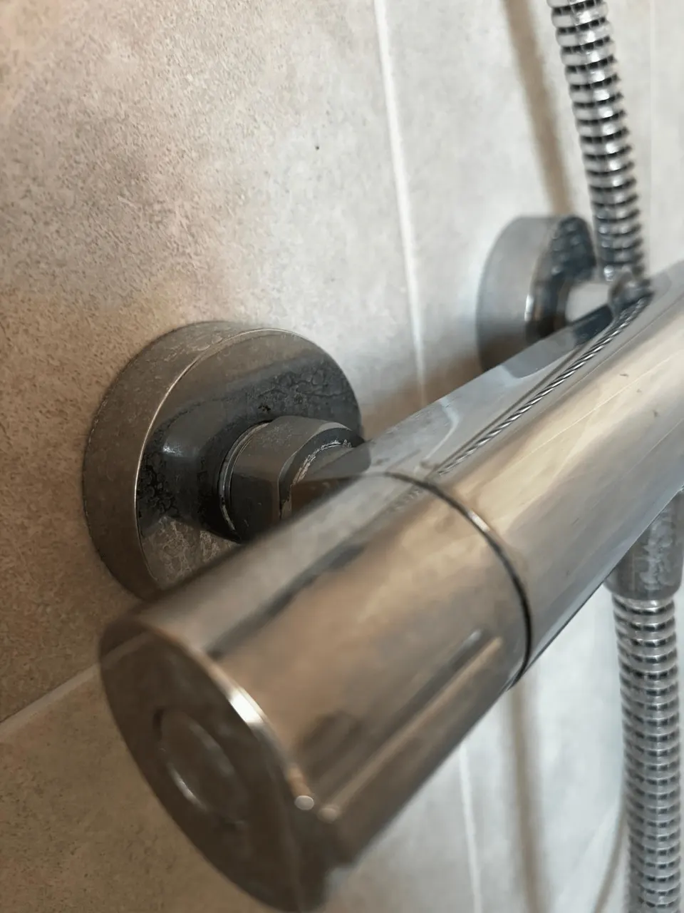 Thermostatic shower valve dull with limescale and water marks